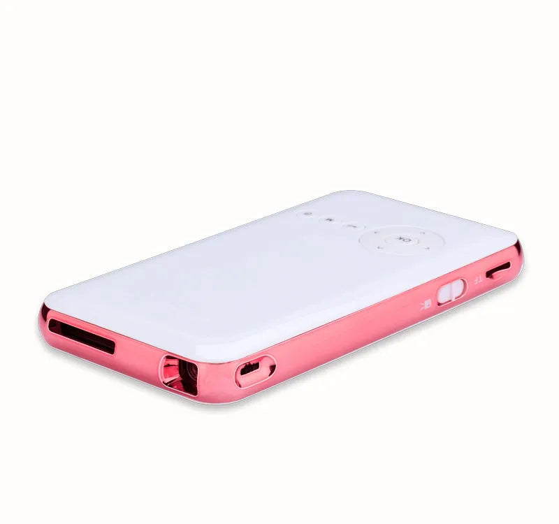 White and rose gold M6S miniature Android DLP projector showing compact size next to a smartphone for scale.