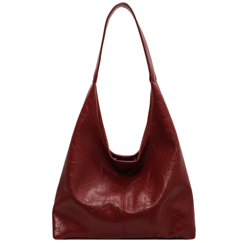 Casual soft PU leather shoulder bag in street trend style with a sandwich pocket.
