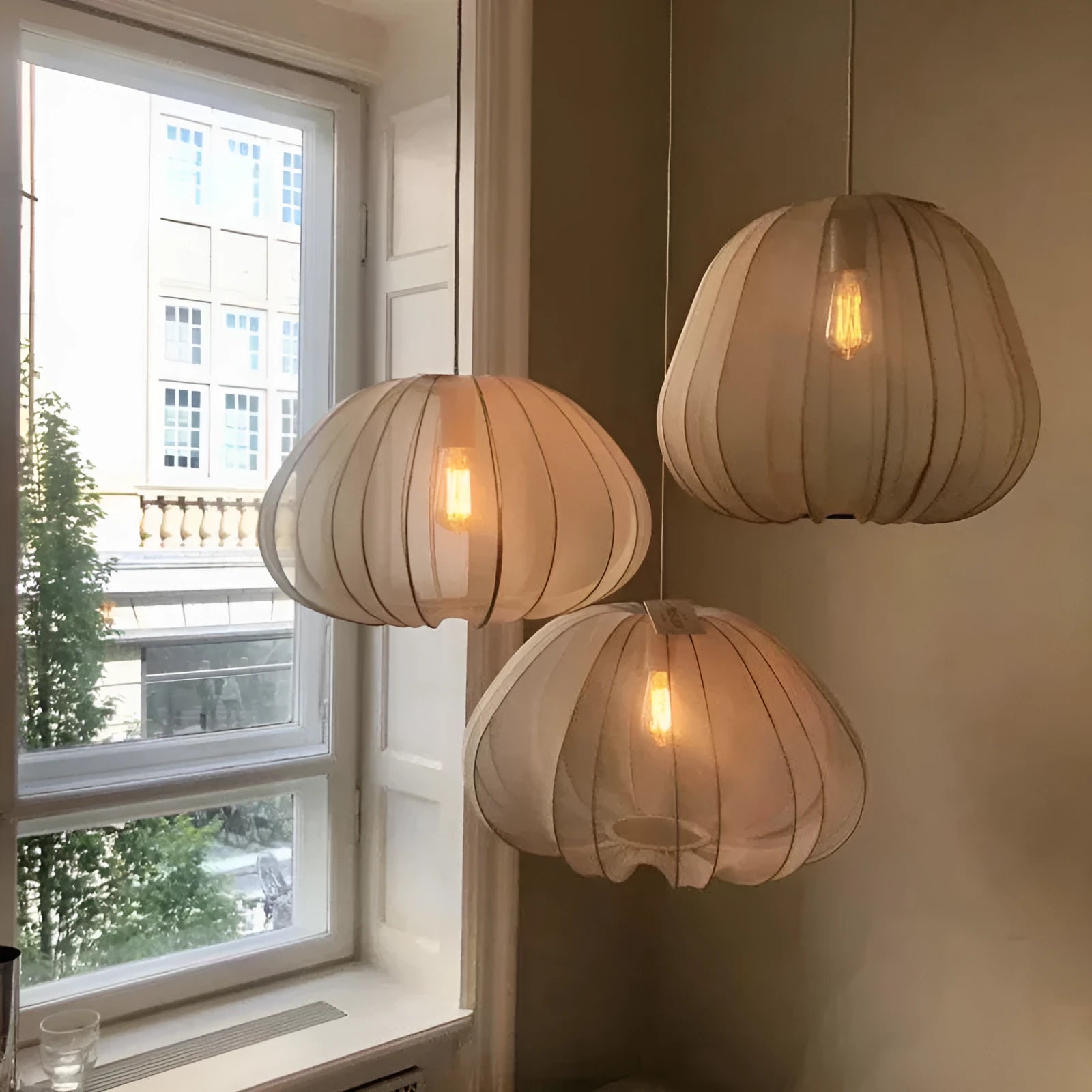 Japanese style branch pendant ceiling lamp in iron, shown in a grey-blue finish with LED lights illuminated.