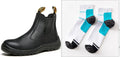 Black leather high-top safety work boots with anti-piercing sole on a work site background.