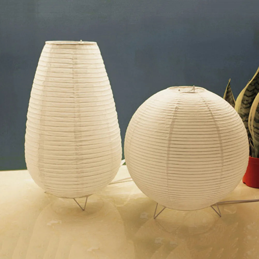 White rice paper plug-in table lamp with E14 bulb socket on wooden desk