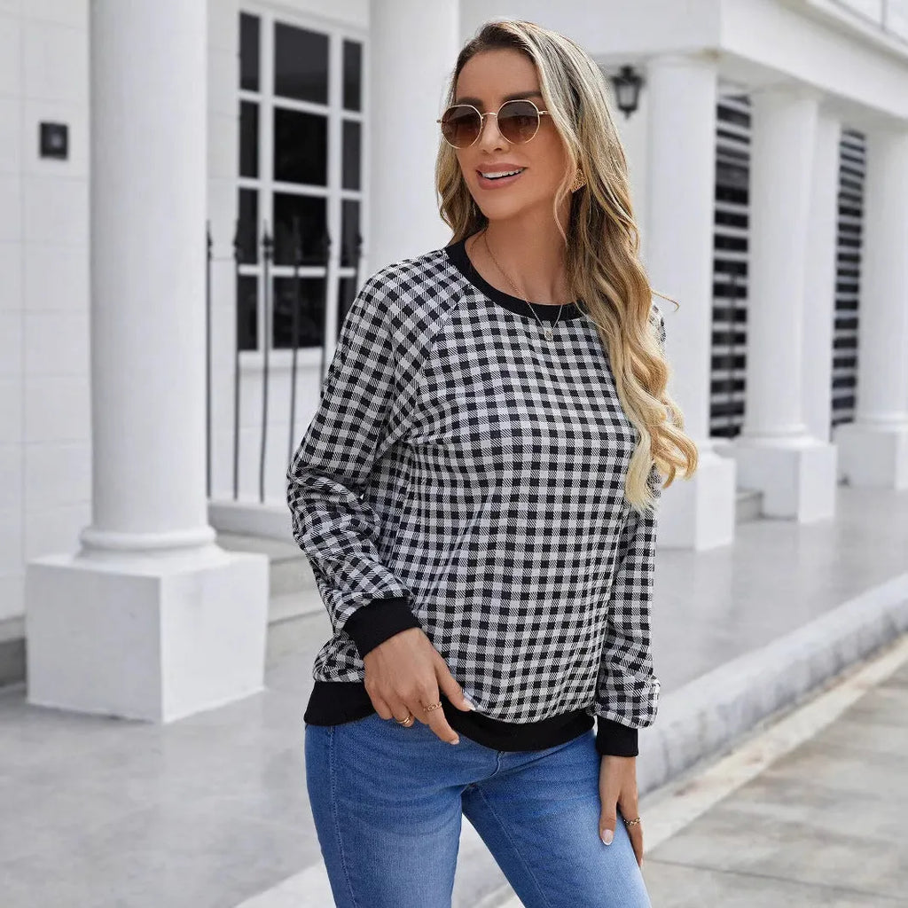 Black long sleeve polyester pullover sweater with a printed Japanese sweet plaid stripe pattern.