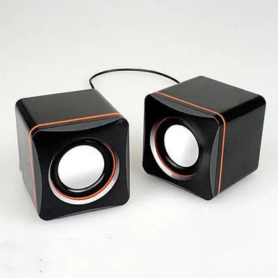 Small square black USB-powered 2.0 computer speaker for PC desktop.