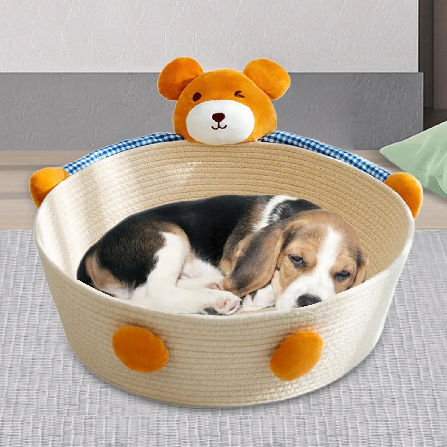 Woven cotton rope cat bed with scratching surface, shown with bear decoration in medium size.