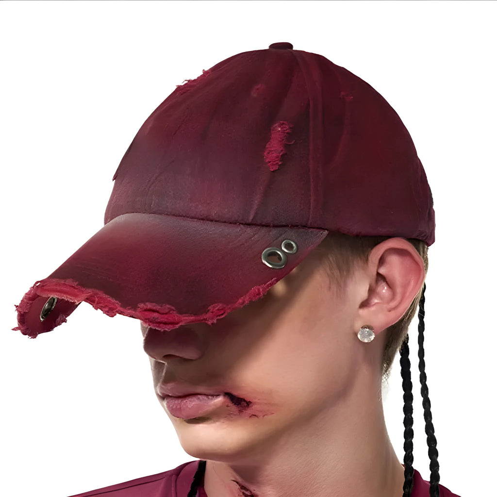 A rose red cotton peaked cap shown on a neutral background