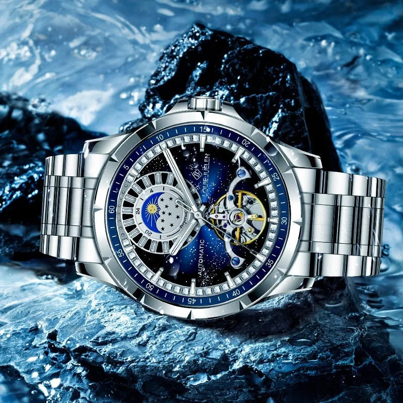 Silver and blue men's automatic mechanical watch with stainless steel strap on a wrist
