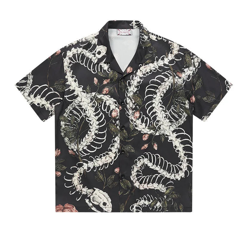 Original designer snake bone pattern printed on a short sleeve Cuban collar shirt in loose fit.
