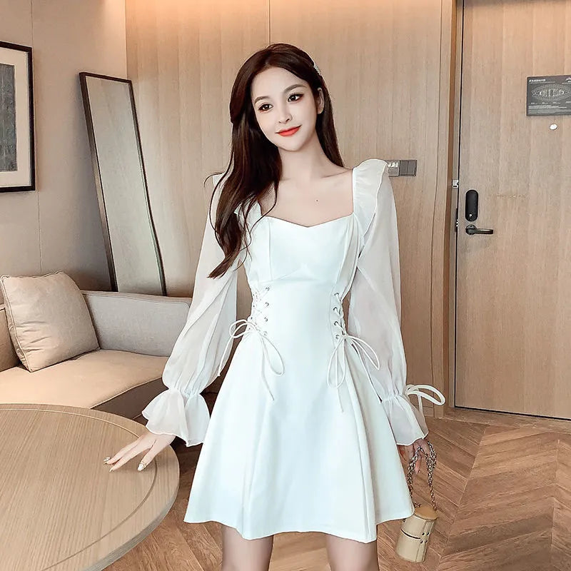 White women's chiffon patchwork dress with long sleeves, a long skirt and a slim waist design.