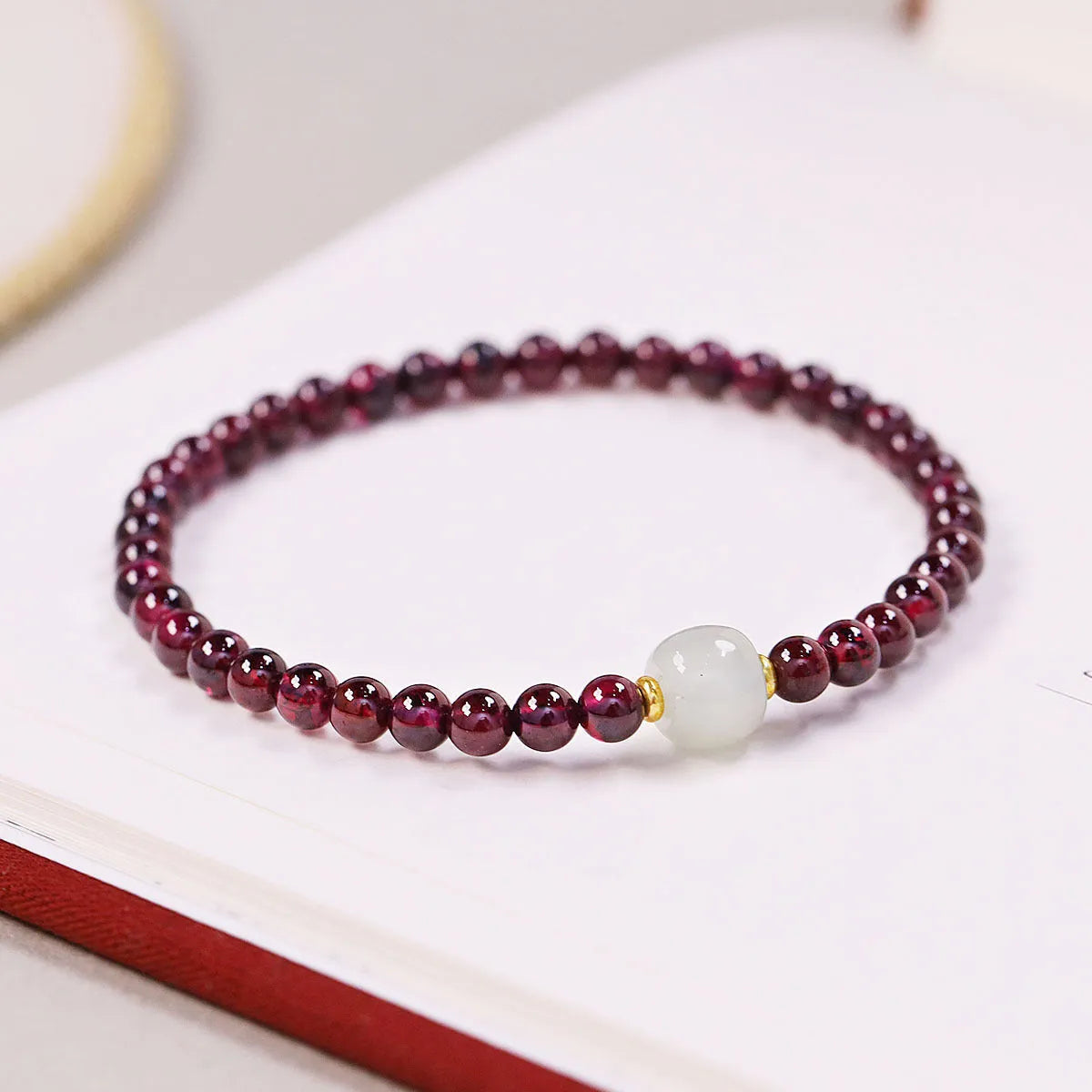 Natural garnet bracelet with U-shaped design, available in 4mm or 6mm stone sizes and two colour variations