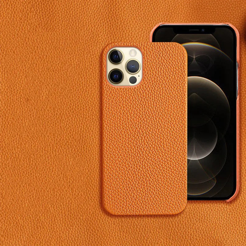 Genuine brown cowhide leather iPhone case with simple half line design on an iPhone 14 Pro Max.
