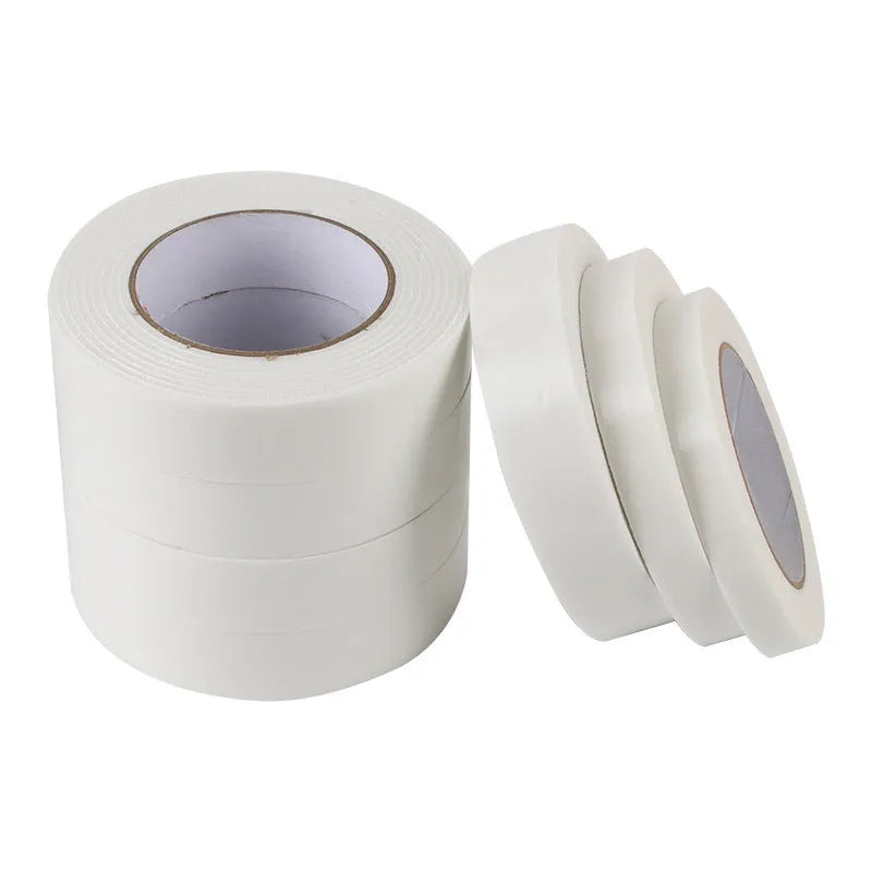 Roll of 3mm thick white foam double-sided adhesive tape with clear BOPP liner, showing width options.