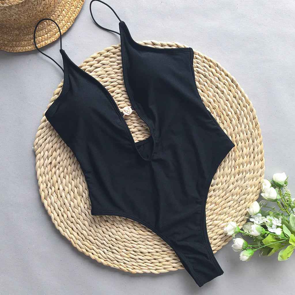 Women's solid colour one-piece swimsuit with high elasticity, shown in a European and American bikini style.