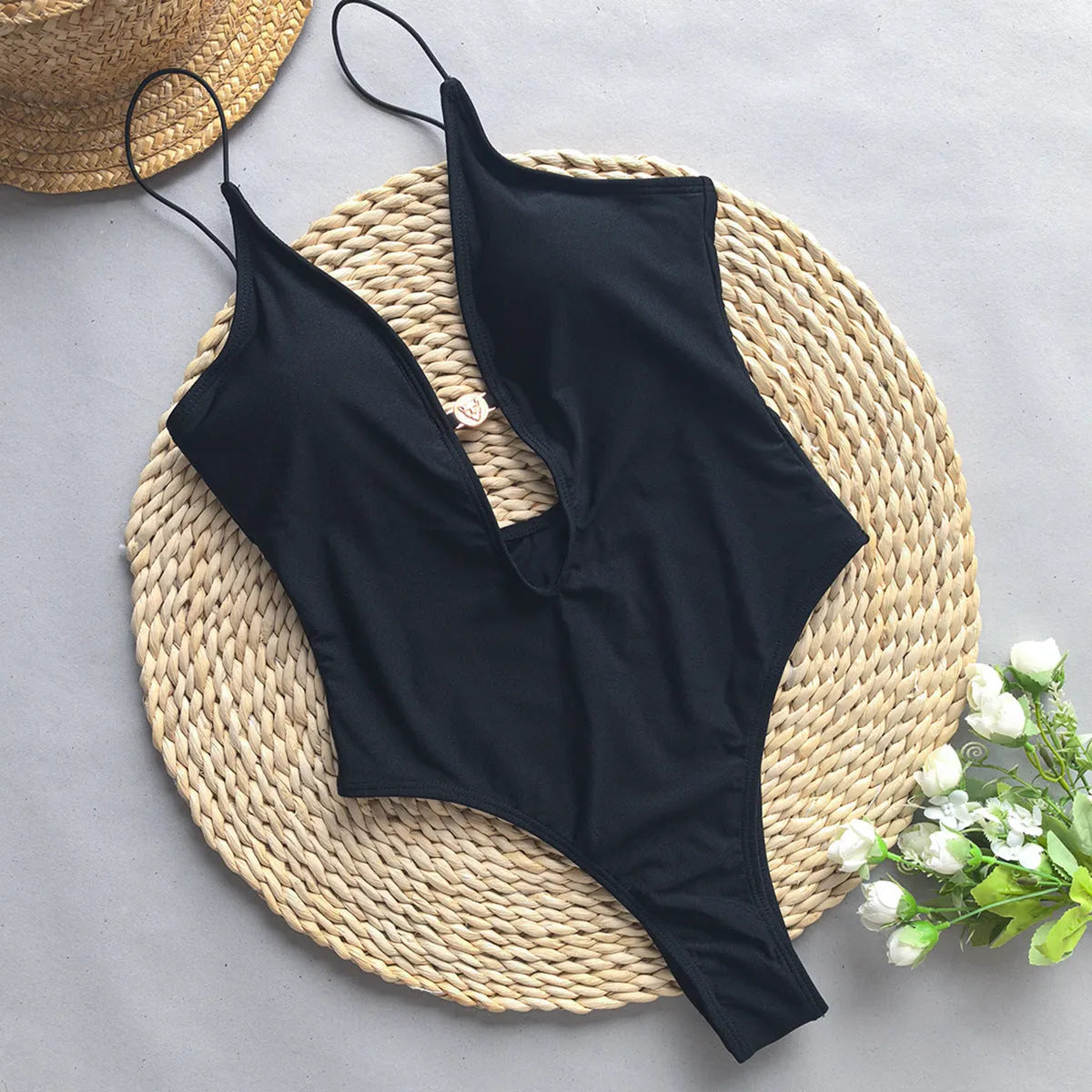 Women's solid colour one-piece swimsuit with high elasticity, shown in a European and American bikini style.