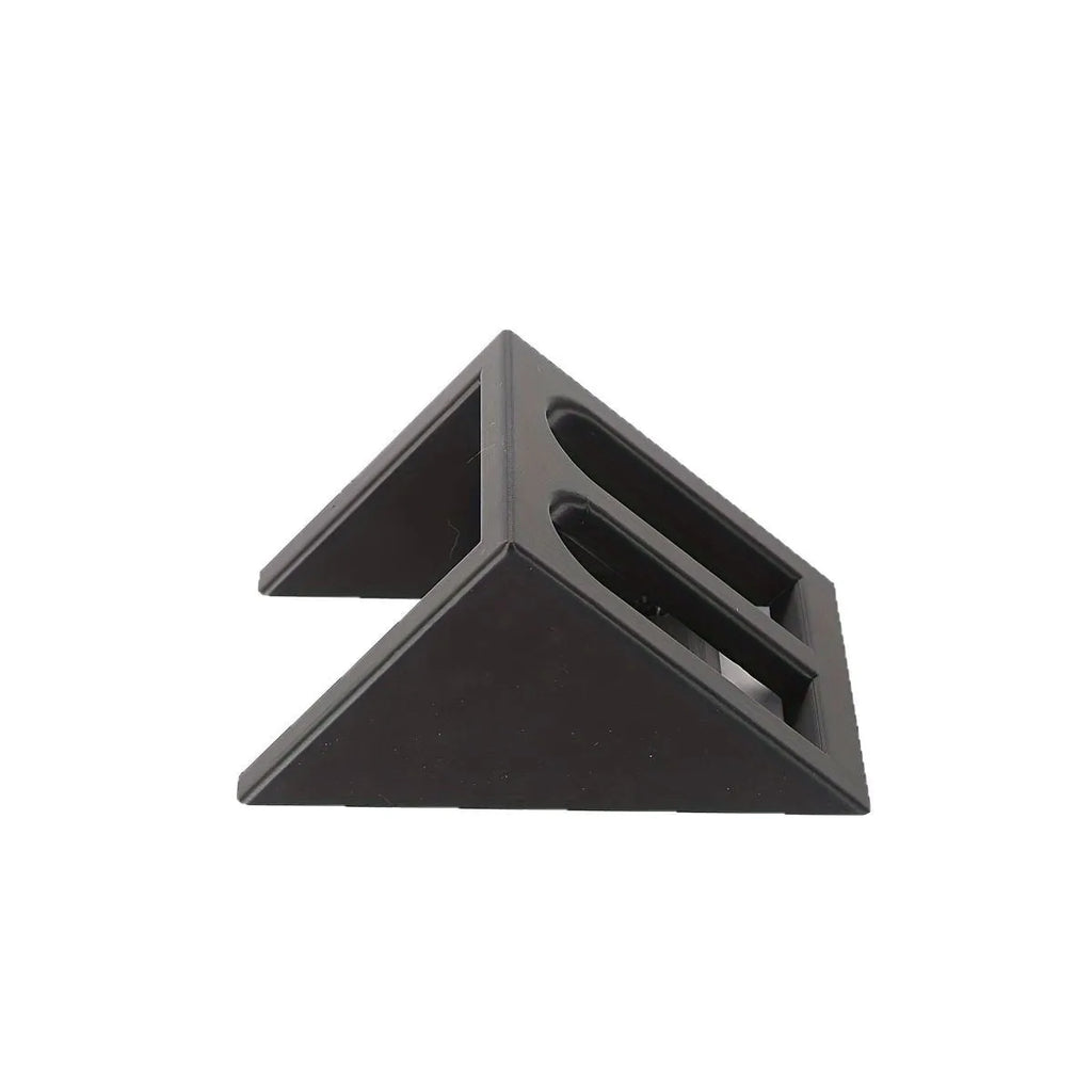 Black punk-style plastic pistol display stand measuring 10.85 by 7.6 centimetres.
