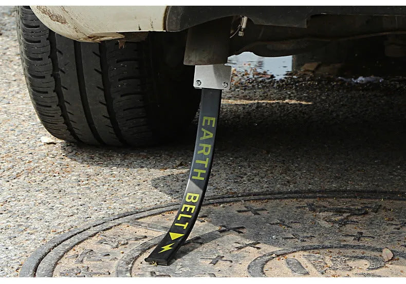 Black car electrostatic grounding belt, 37cm long with metal hook, shown against a vehicle tyre.
