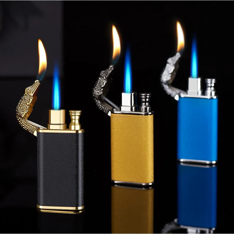 Double flame metal novelty lighter with dragon design showing blue jet fire.