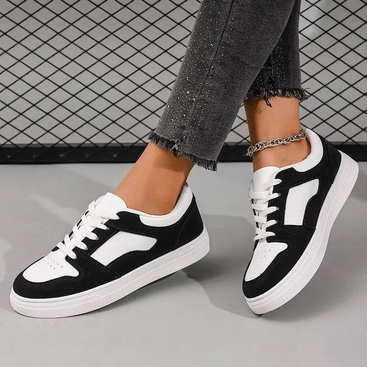 Black women's casual sports shoes with round toe and artificial PU upper on rubber soles