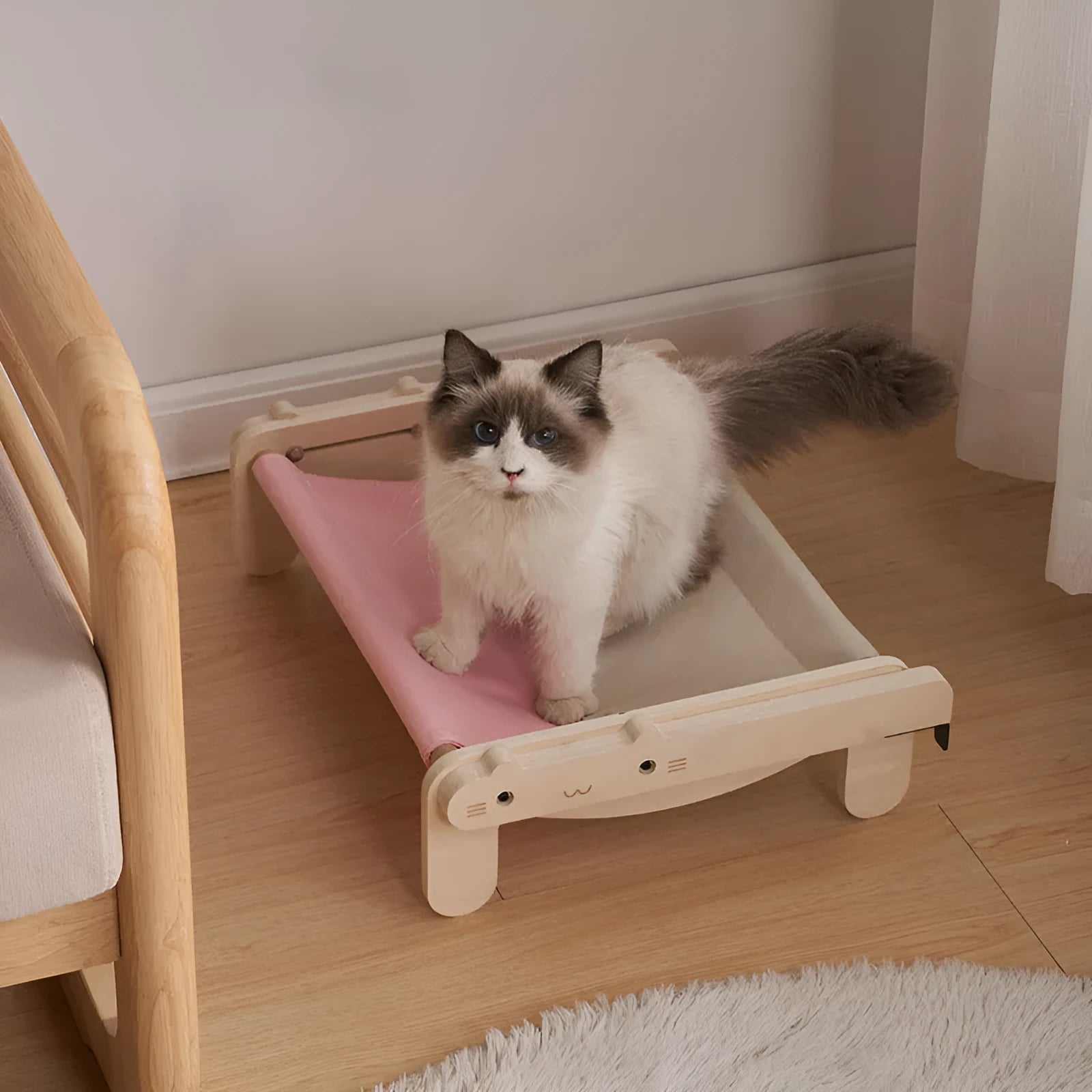 Solid wood pet bed for cats with a removable plaid cover