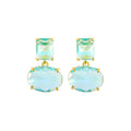 Pair of geometric earrings with gold plated copper base and golden blue glass pendant in ellipse shape on white background