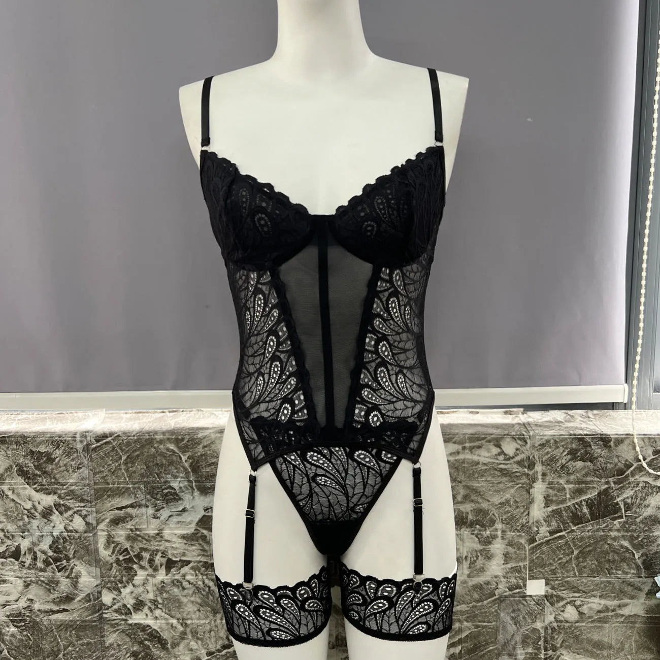 Black polyester lace jumpsuit underwear set for women, shown in size medium.