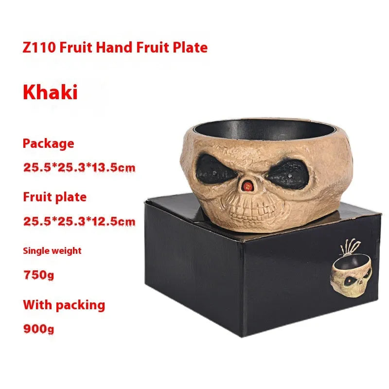 Plastic Halloween pumpkin candy bowl with motion-activated skeleton hand and lighted red eyes