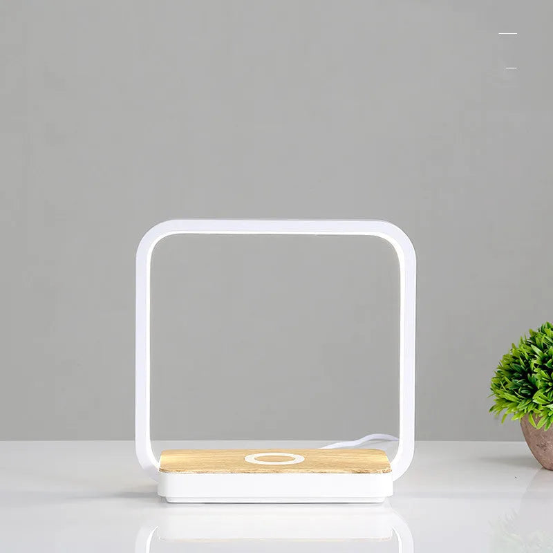 Simple modern bedside lamp with mobile phone wireless charging for bedroom and study desk