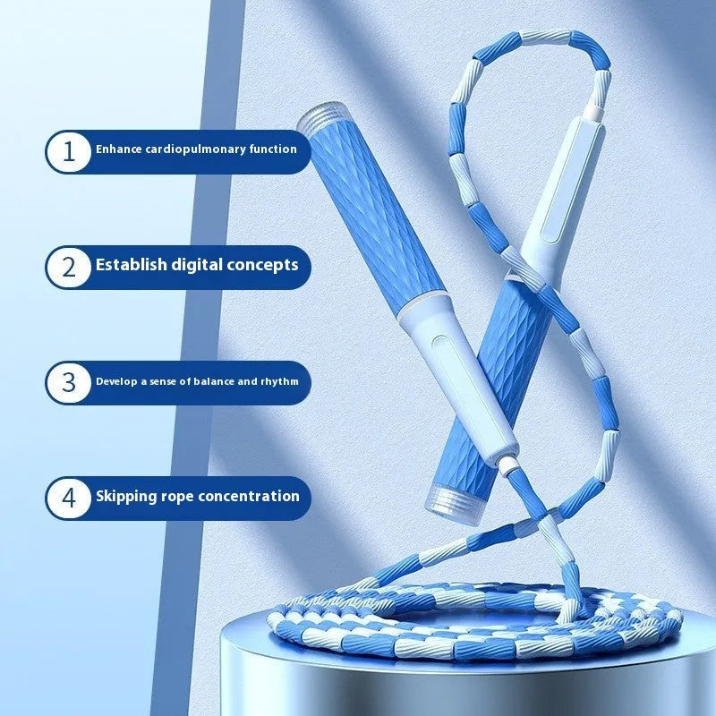 Children's skipping rope with soft blue bead handles and a non-knotted beaded cord.