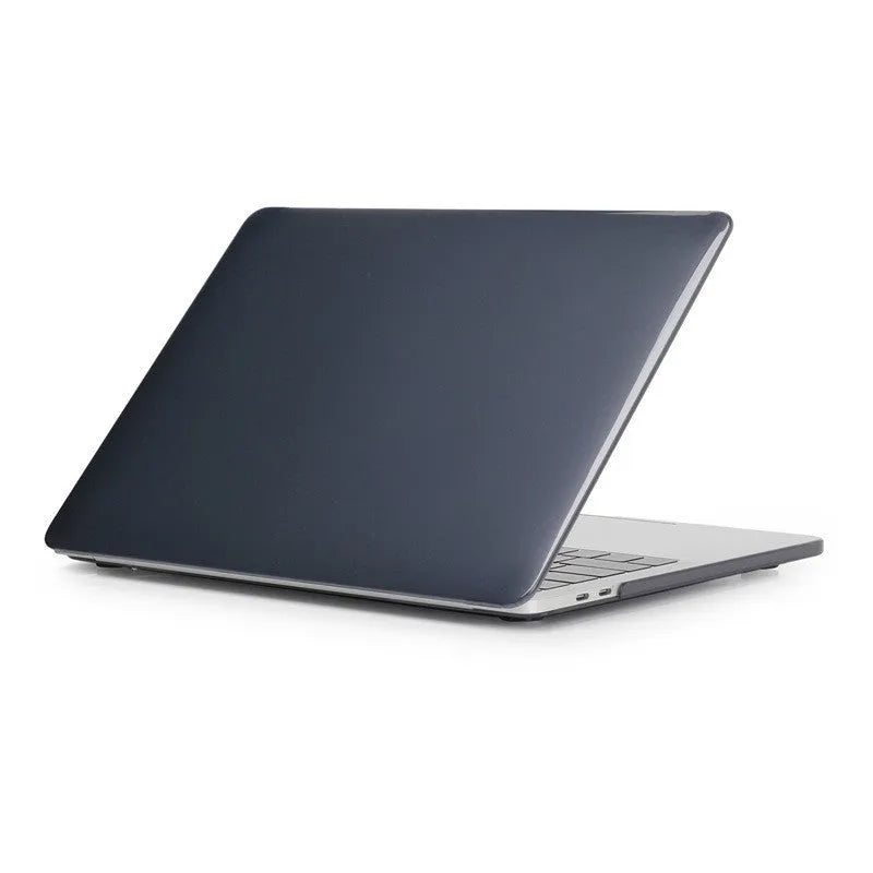 Black and transparent PC hard shell protective cases for MacBook Pro 14-inch and 16-inch laptops.
