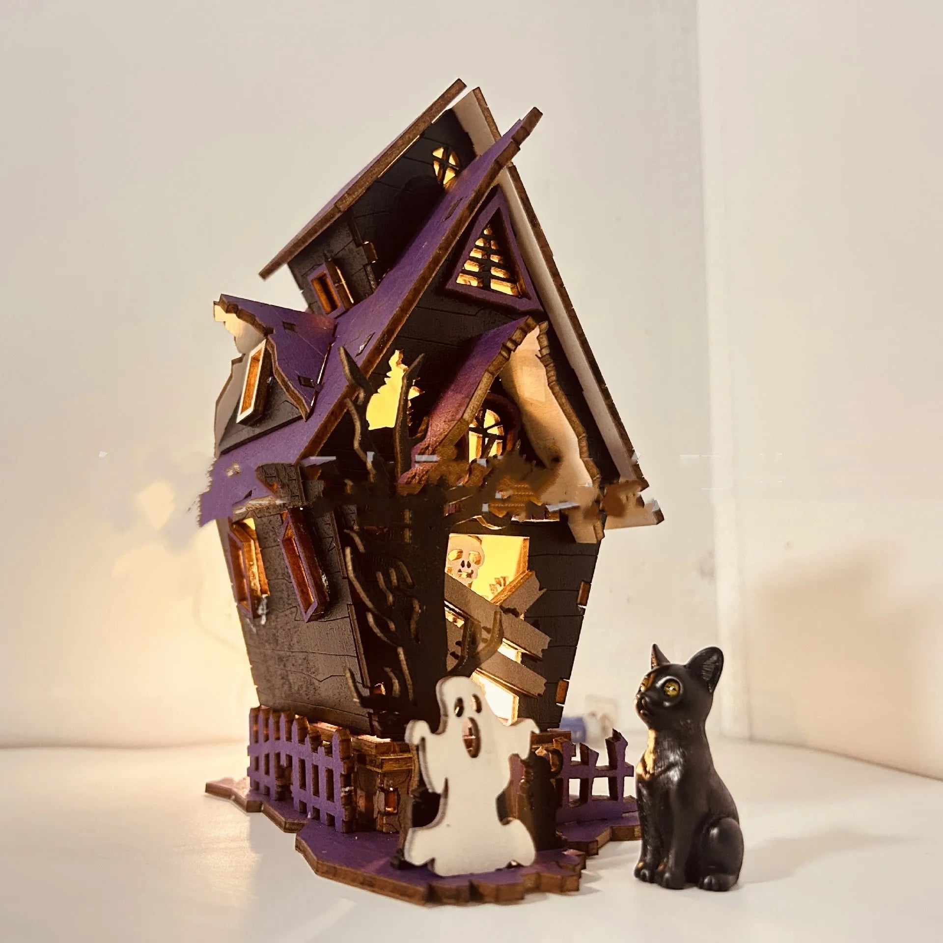Wooden DIY haunted house Halloween table decoration measuring 14cm wide by 19cm tall