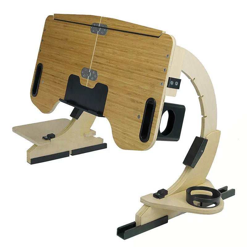 White maple wooden folding bed table with laptop at an adjustable angle on a duvet.