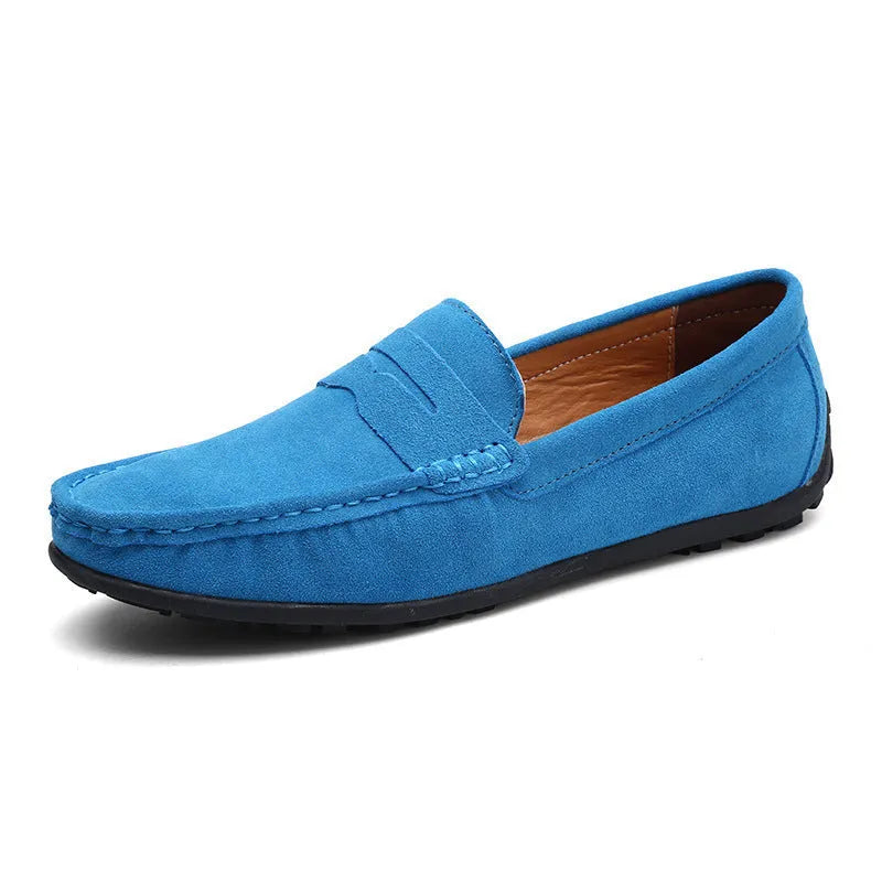 Men's brown suede Gommino-style low-top casual shoes with a round toe and flat rubber sole.