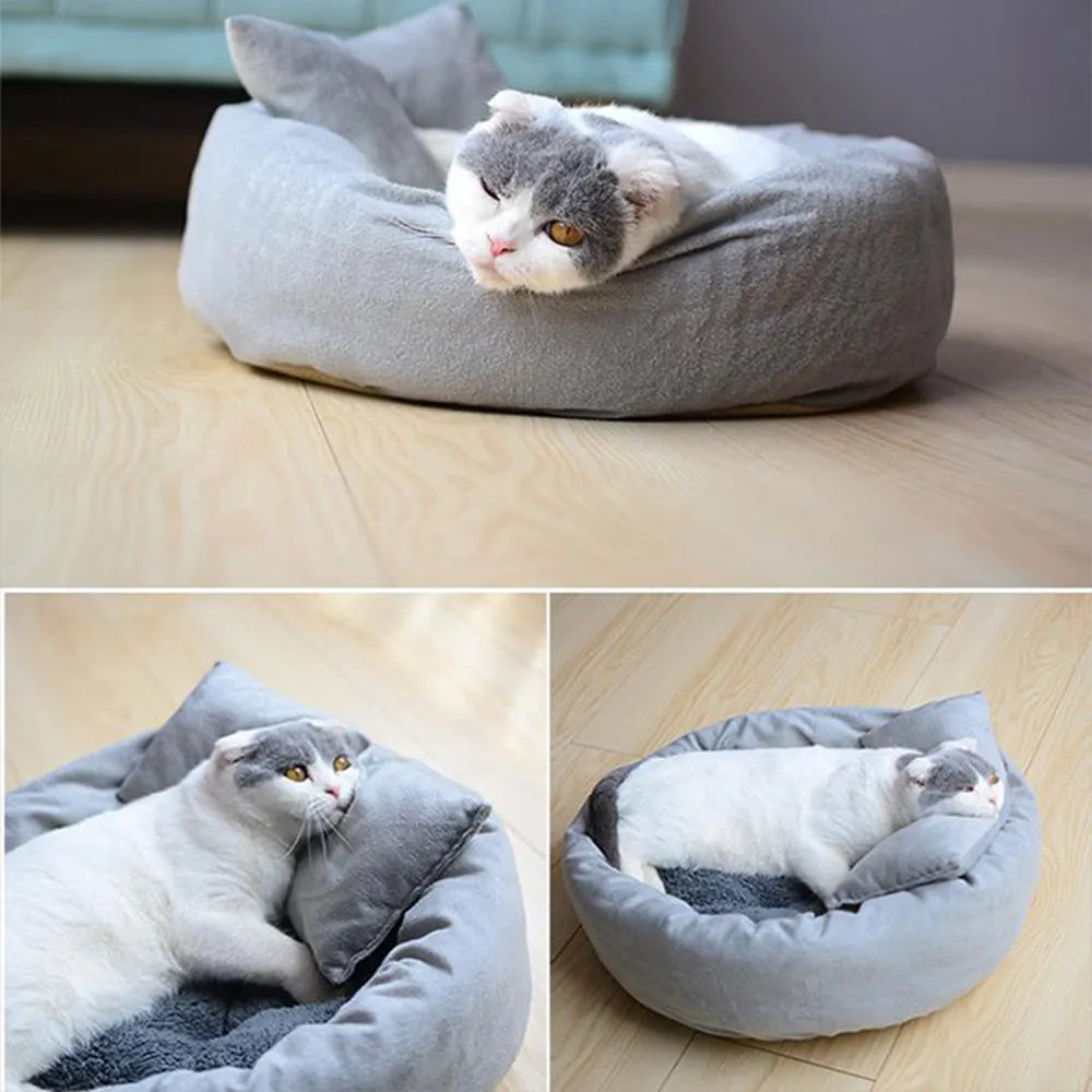 Grey round plush pet bed with raised rim and removable pillow for small dogs and cats.
