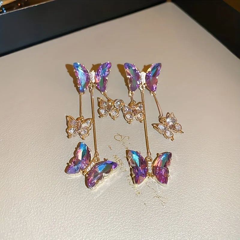 Silver Needle Crystal Flowers Butterfly Tassel Earrings in blue purple with a 5.5cm drop on a hypoallergenic alloy post.