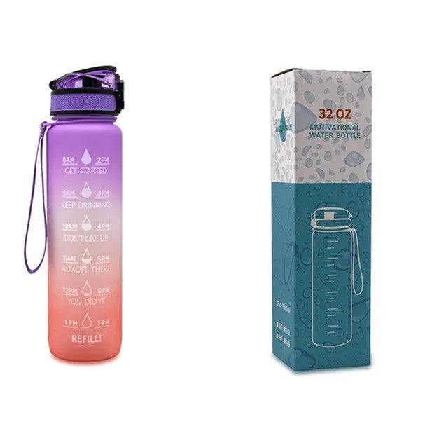 Blue-red gradient 1L Tritan water bottle with time markers and flip-top lid on a gym bag