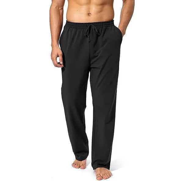 Men's loose fit quick-dry trousers in dark grey colour for sports and leisure activities