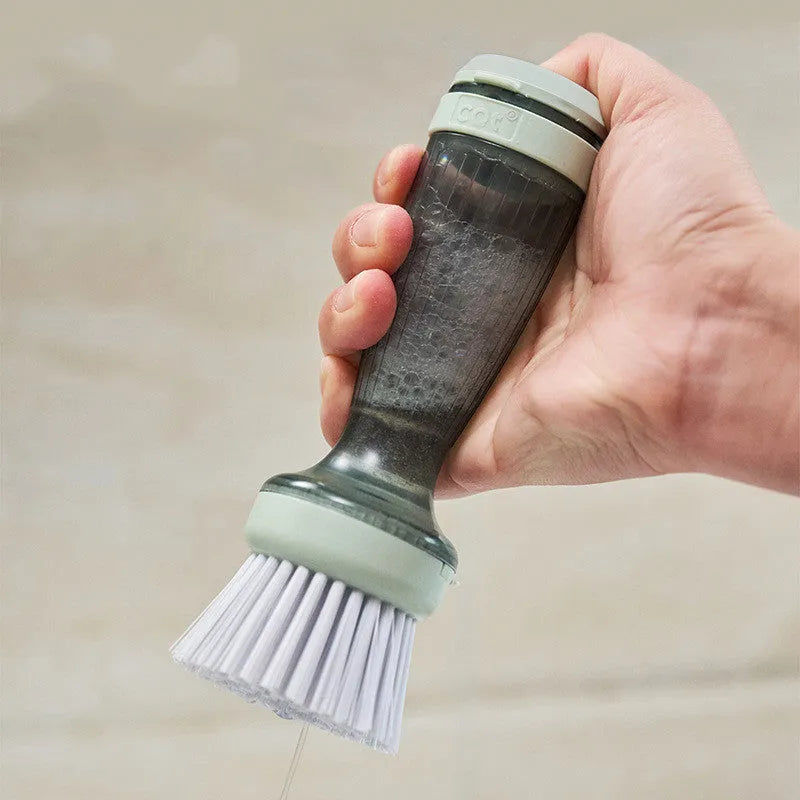 Milk white and mint green kitchen dish brush with soap dispenser and replaceable non-scratch head.