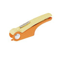 White manual garlic press with stainless steel crusher and ABS plastic handle.