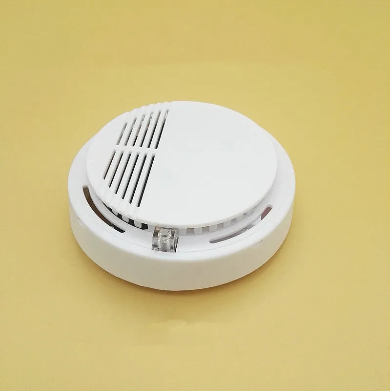 White ceiling mount household smoke alarm model SS-168 with 60m detection range