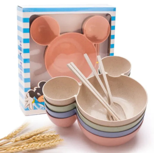 Children's wheat straw bowl set featuring Mickey cartoon design with chopsticks, fork, and spoon in beige