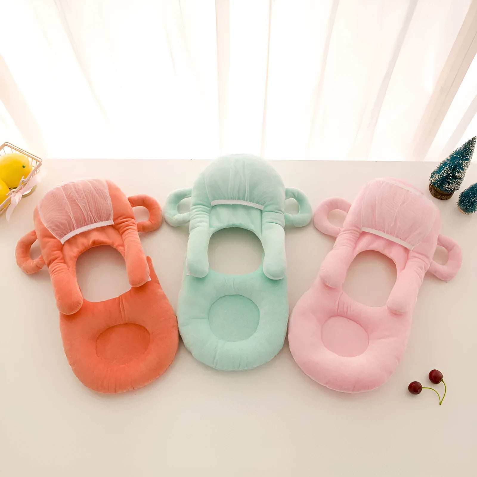 Super soft short plush baby feeding pillow measuring 30cm by 42cm in pink colour