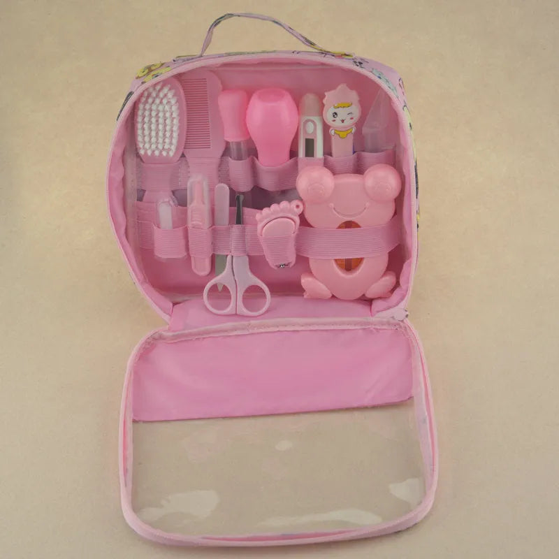 Roadfisher newborn baby care kit with grooming tools and health monitoring devices in blue or pink colour
