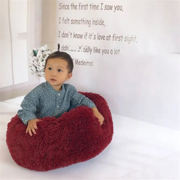 Round long hairy cat bed in plush fabric with anti-slip bottom for autumn and winter