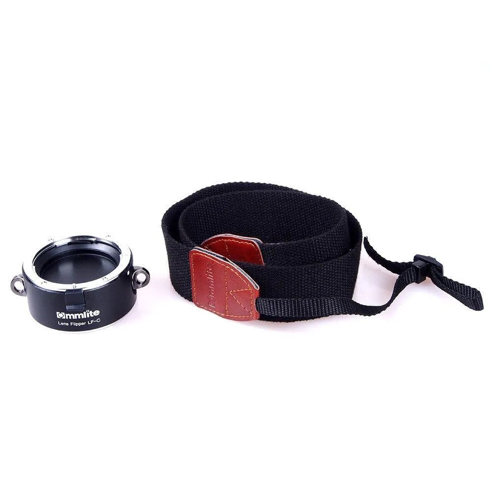 Aluminium camera lens flipper holder on a cotton shoulder strap for quick lens changes
