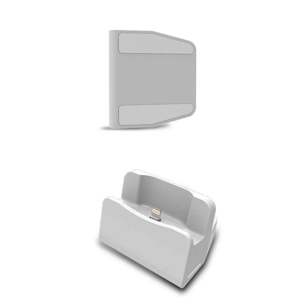 White headphone charging base with minimalist design on desk surface