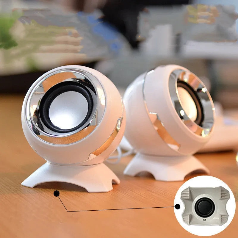 Compact black and gold USB desktop speakers for laptop computers with audio cable