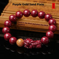 Purple gold sandstone cinnabar bracelet with polished beads and Year of Fate symbolism.