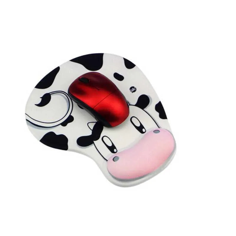 Cow silicone wrist mouse pad with soft hand rest and non-slip base on a desk