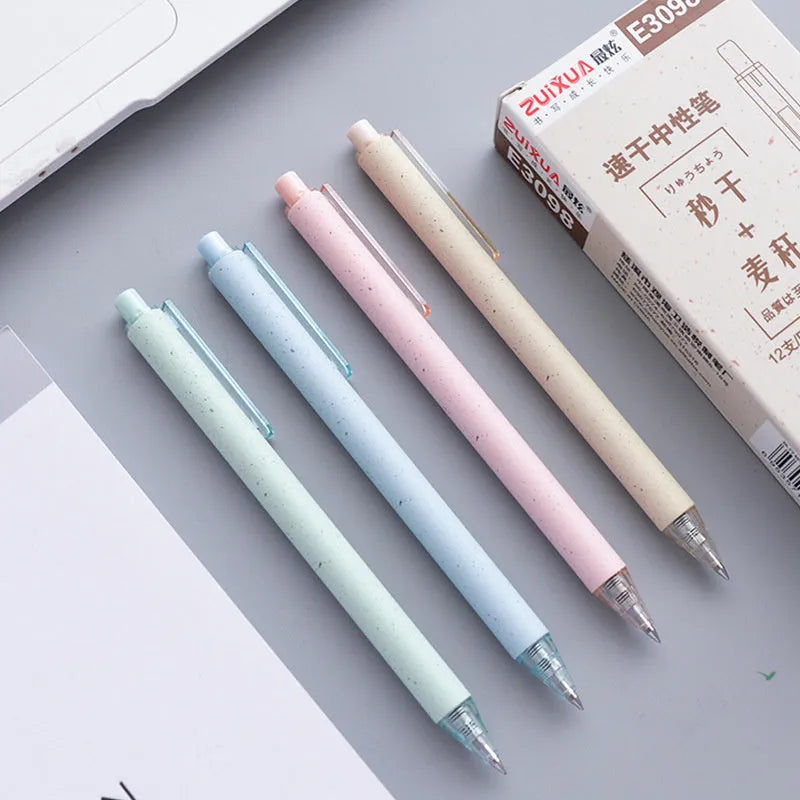 Set of twelve 0.5mm push-type gel pens in beige, blue, green, and pink barrels with black ink.