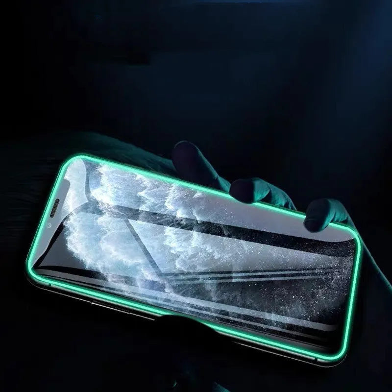 Luminous full cover tempered glass screen protector glowing in the dark for iPhone.