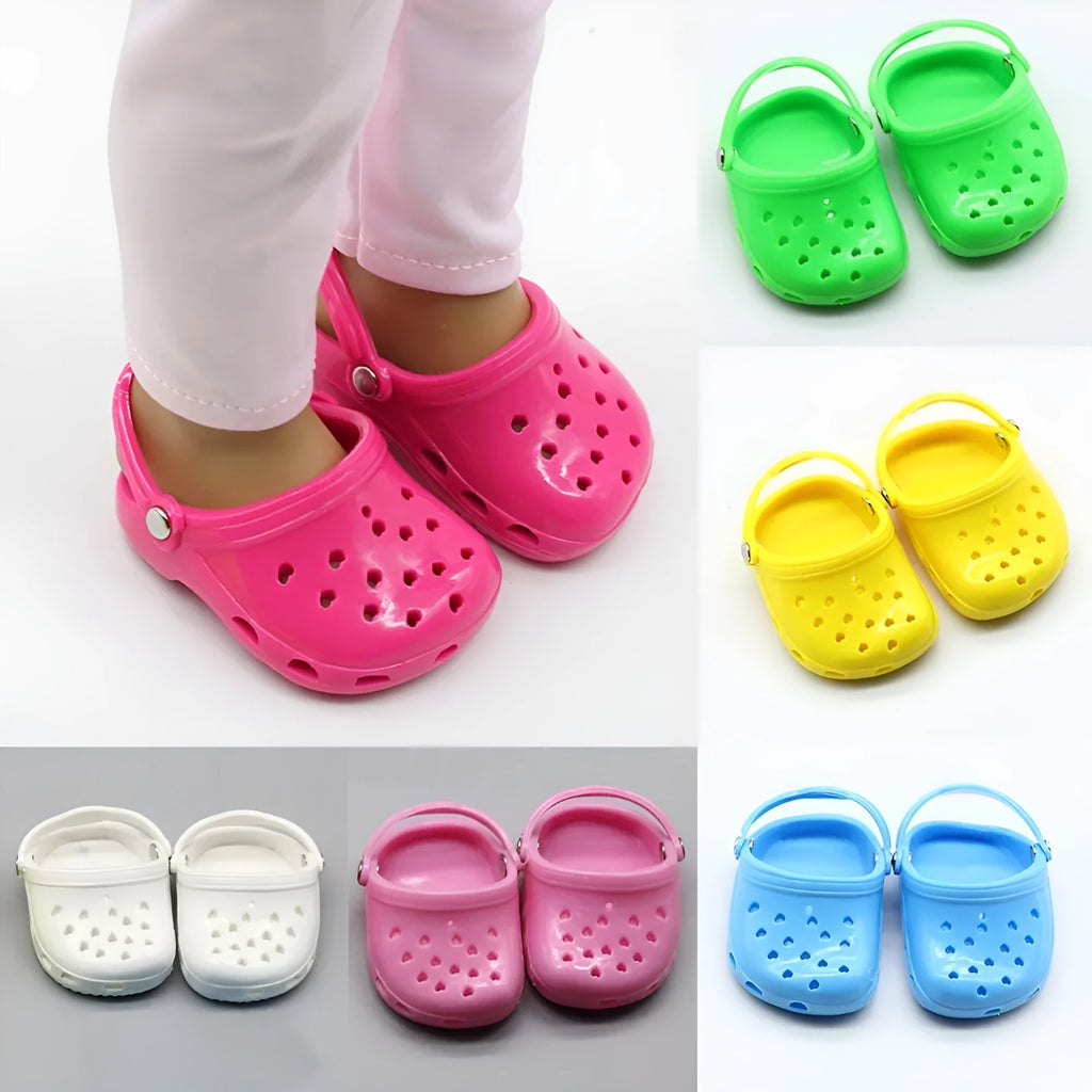 Plastic doll beach slippers in blue, red, yellow, and green colours.